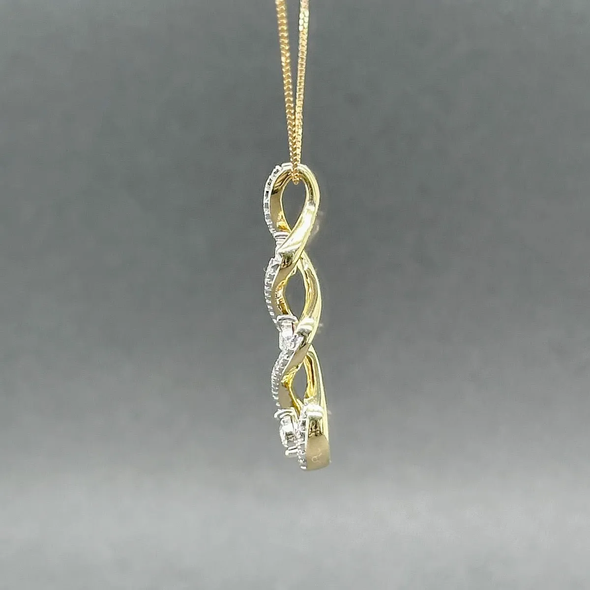 Estate 10K Y Gold 0.15ctw H-I/SI1-2 Diamond Swirl Journey Pendant