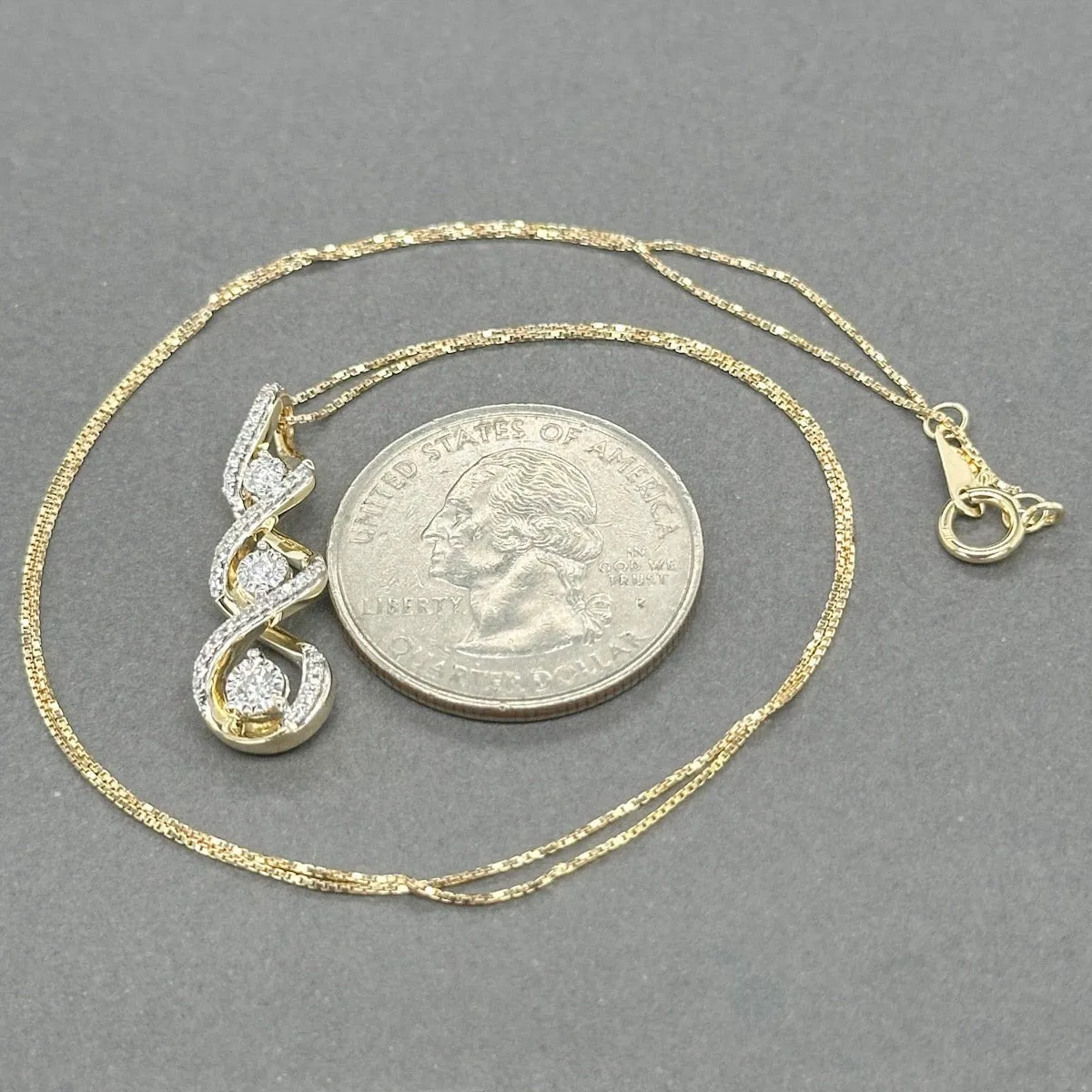 Estate 10K Y Gold 0.15ctw H-I/SI1-2 Diamond Swirl Journey Pendant