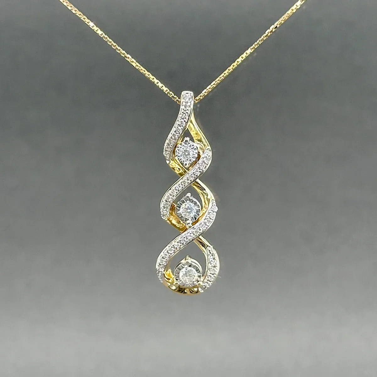 Estate 10K Y Gold 0.15ctw H-I/SI1-2 Diamond Swirl Journey Pendant